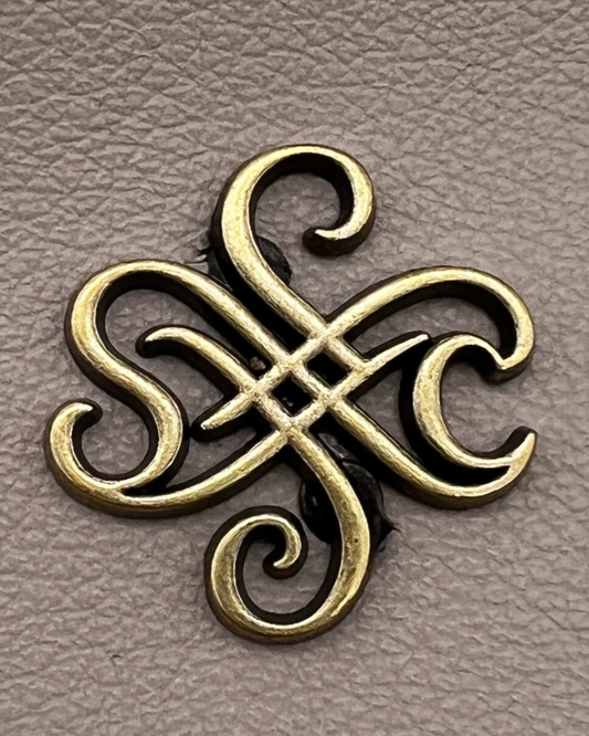 Signature Scroll Motif Metal Bag Tag