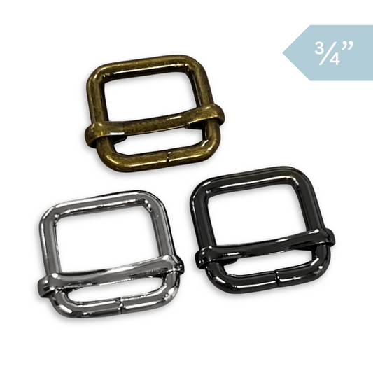 Three metal slide adjusters in bronze, nickel, and gunmetal, shown on a white background